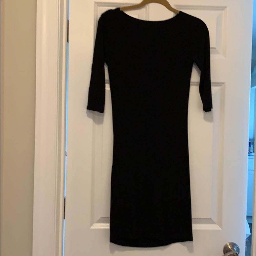 Black three quarter length pleated maternity dress